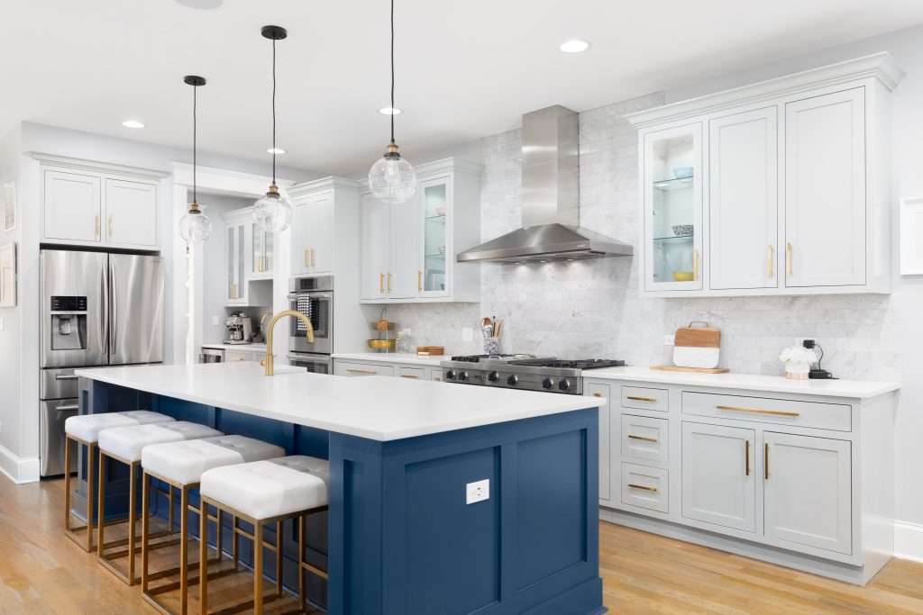 remodeled kitchen with blue cabinets